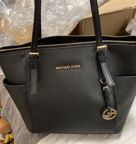 michael kors purse repair shop.